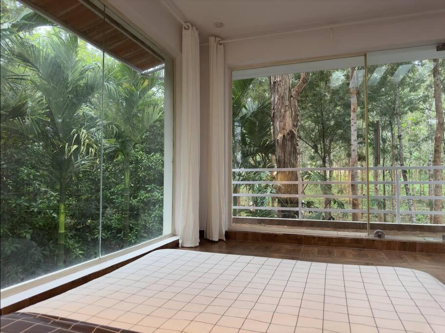 Serenity Farm Stay Hampapura Bagian luar foto